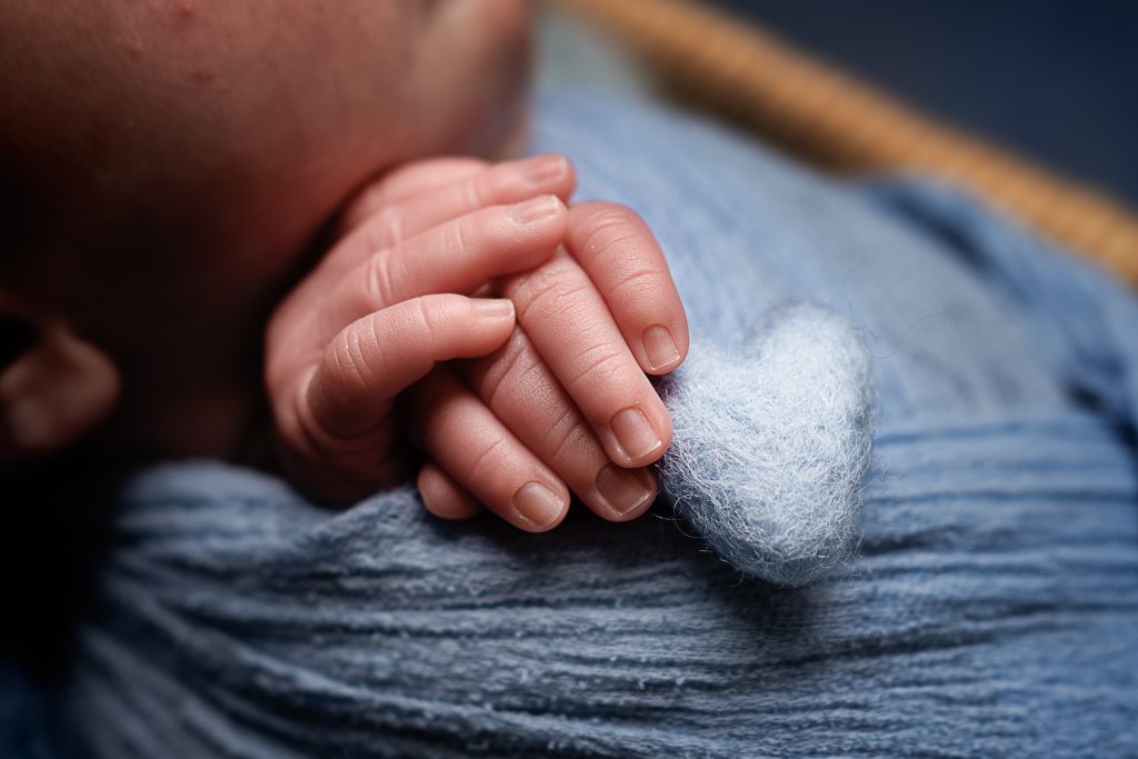 Stunning Newborn Photographs in the Dunmow and Bishop’s Stortford area - hands fingers