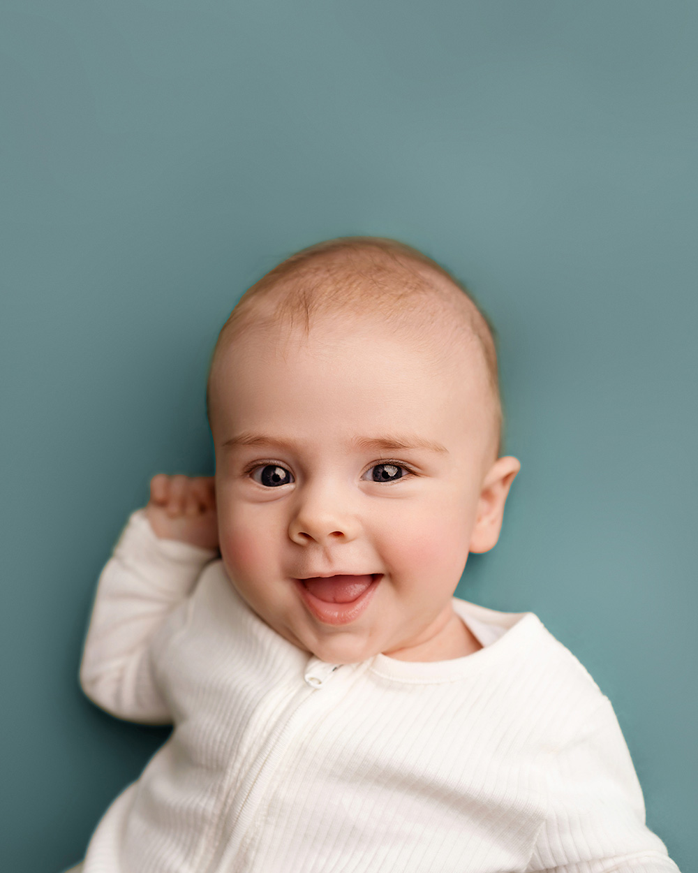 photo of cute smiling baby boy